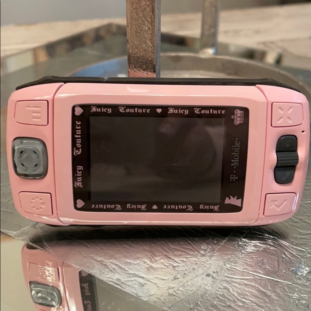 Rare vintage Juicy Couture Sidekick II phone.